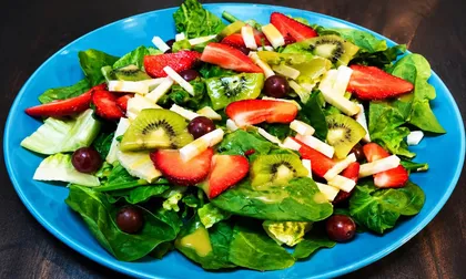 Strawberry salad with feta, walnuts and citrus agave dressing